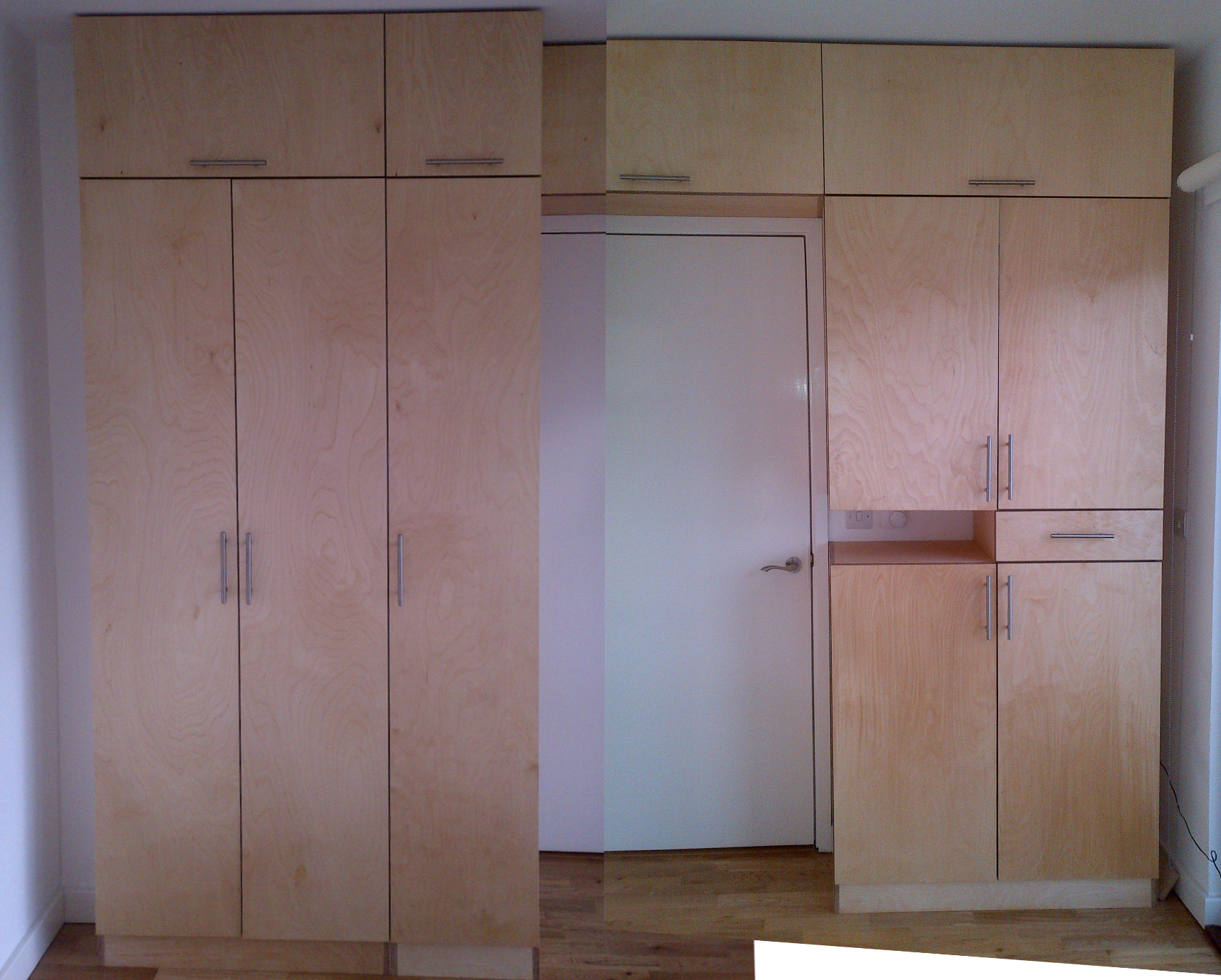 “Photo montage of customer designed cabinetry